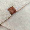 Couverture de berceau en laine / couverture pour bébé – Thumbled Woolskins beige