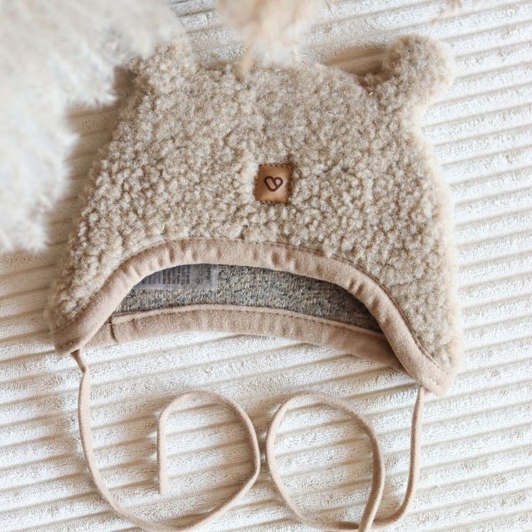 wollen-babymutsje-met-oortjes-100-procent-lamswol.jpg